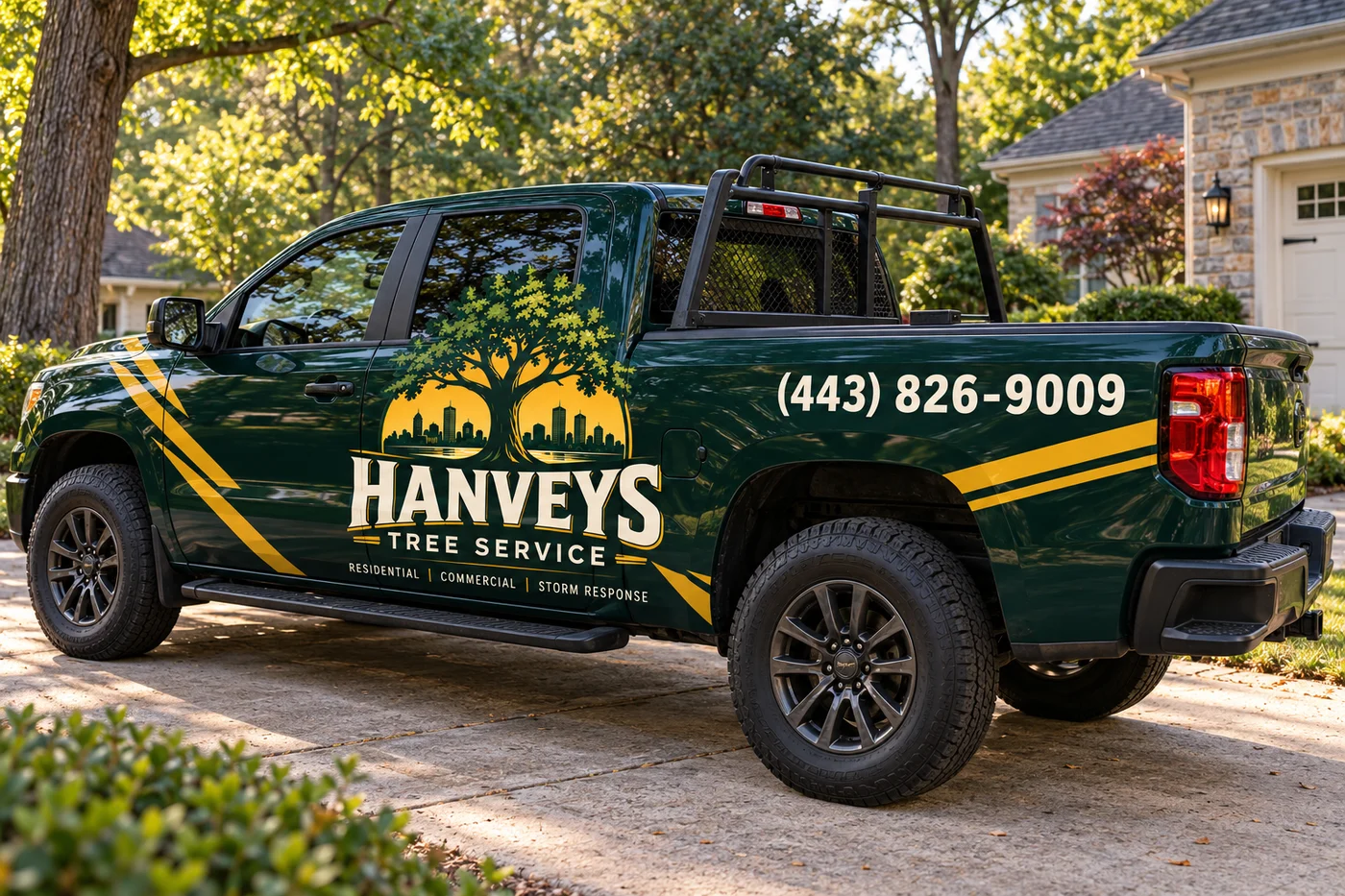 Forest-green Hanvey’s pickup wrap concept with tree logo and company phone number